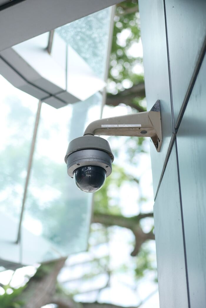 Dome CCTV camera mounted on a wall